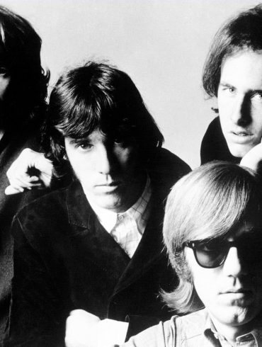 The Doors posing for a photo in 1968.