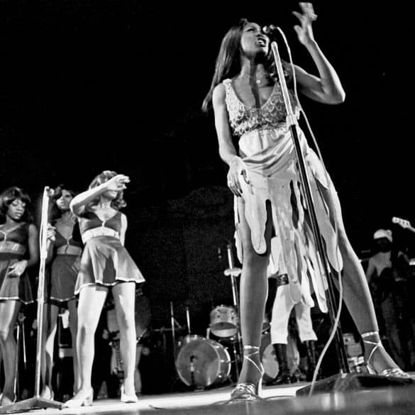 Tina Turner, Claudia Lennear, and The Ikettes performing on stage.