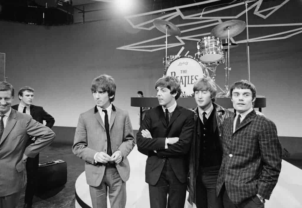 Young Paul McCartney: The "Cute Beatle" Through The Years A young Paul McCartney and the Beatles in 1964.