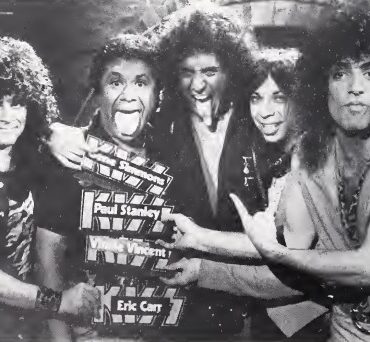 Eric Carr and the band Kiss.