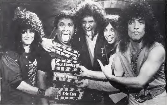 Eric Carr and the band Kiss.