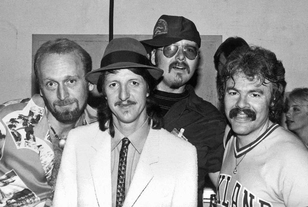 The Doobie Brothers 9/11/82; Backstage at the Greek Theater in Berkeley, California. Left to right: Michael Hossack, Patrick Simmons, John Hartman, Tom Johnston.
