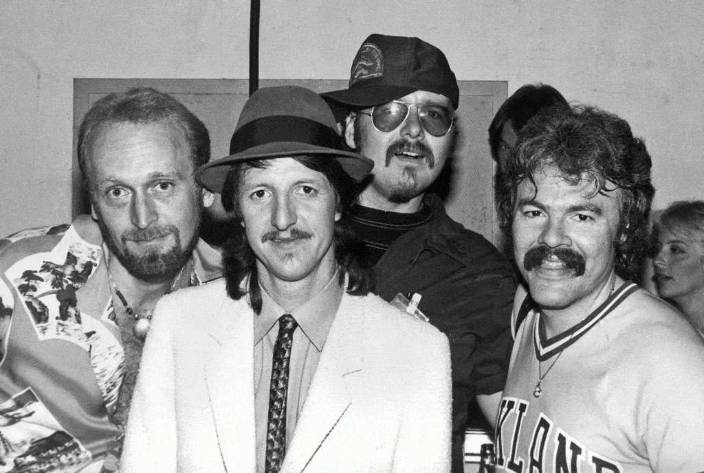 The Doobie Brothers Songs: 10 Essential Tracks You Need to Know The Doobie Brothers 9/11/82; Backstage at the Greek Theater in Berkeley, California. Left to right: Michael Hossack, Patrick Simmons, John Hartman, Tom Johnston.
