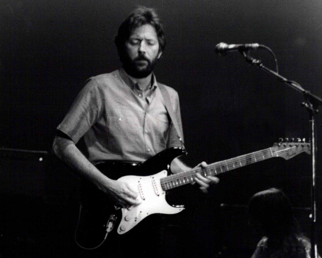 Eric Clapton playing guitar.