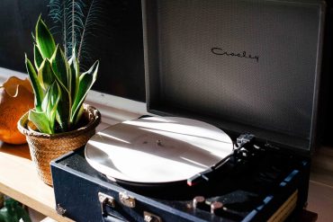 Portable Record Player on a desk.