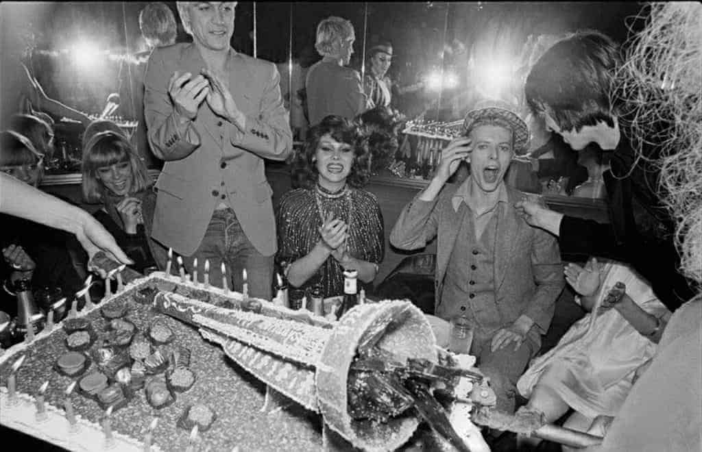Romy Haag: Bowie's Berlin Sweetheart Iggy Pop and David Bowie with Romy Haag in a nightclub in West Berlin celebrating Bowie's 30th birthday 1977.