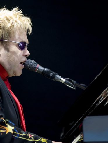 Elton John performing live