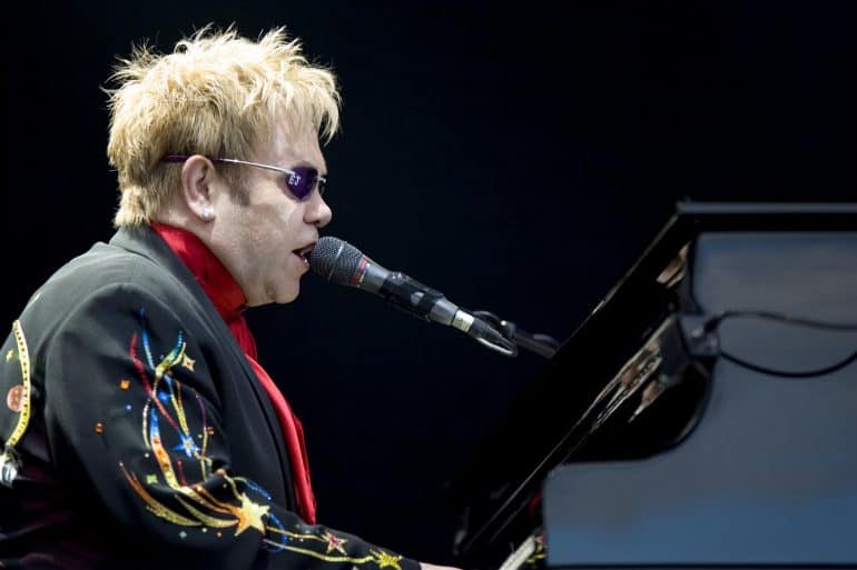Elton John performing live