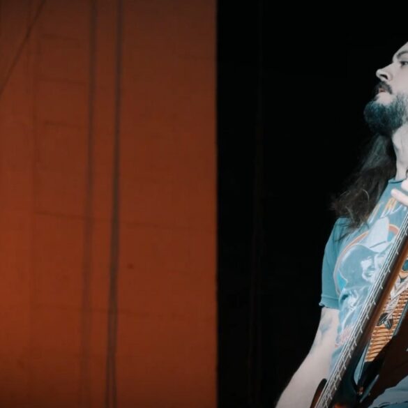 Rock Star playing a guitar on a stage