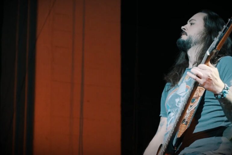 Rock Star playing a guitar on a stage