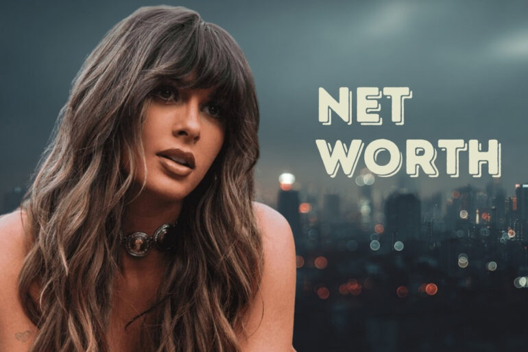 A woman with long wavy hair in front of a blurred city skyline at night, with the words “Net Worth” beside her
