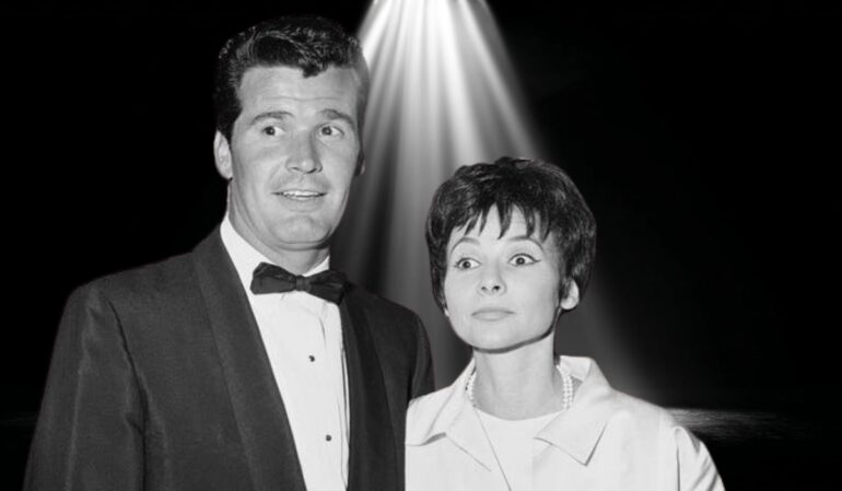 Black-and-white photo of James Garner and his wife Lois Clarke standing together under a spotlight