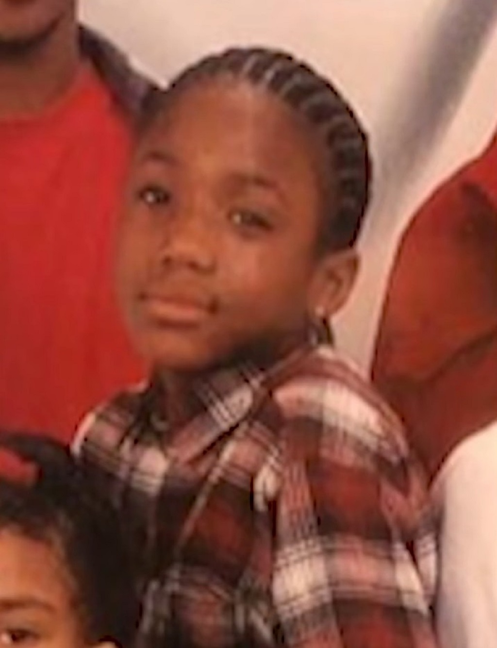 Childhood photo of a young Mozzy