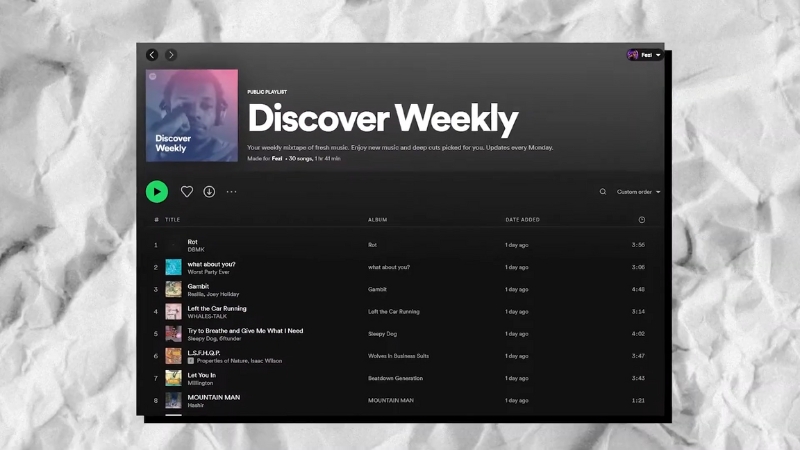 Spotify Discover Weekly playlist screen showing recommended tracks and album art in the desktop app