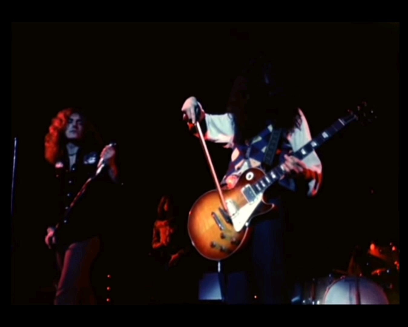 The Connection Between Classical and Rock Music - When Rock Bands Used Classical Instruments Jimmy Page guitar solo violin bow