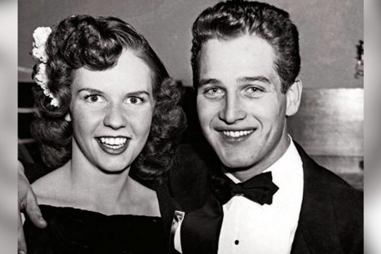 Jackie Witte and Paul Newman poses together in formal evening clothes