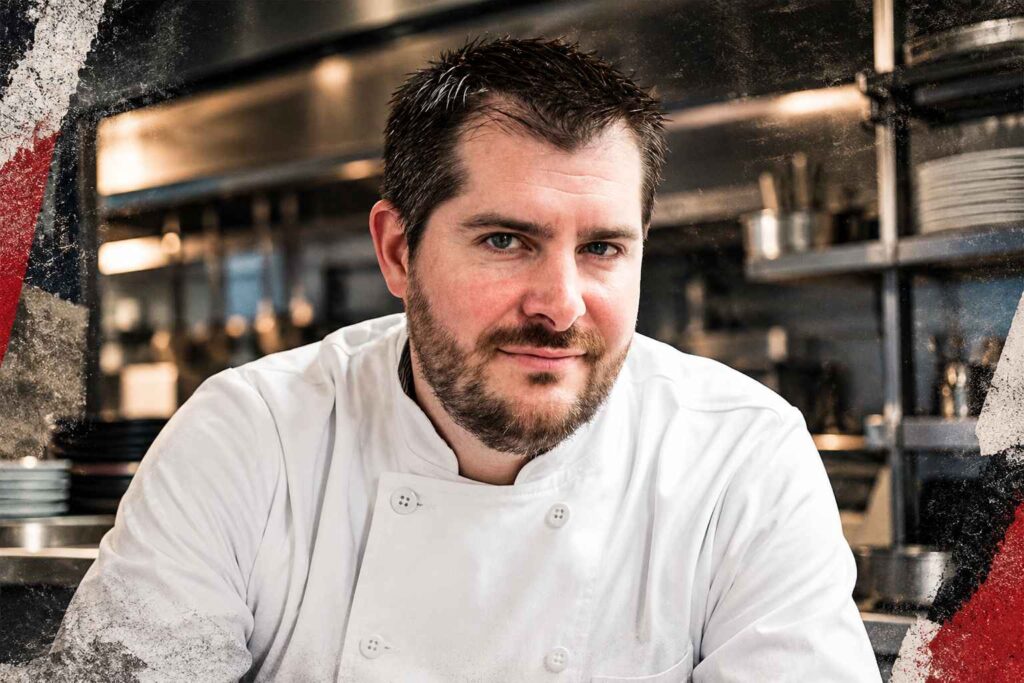 7 Famous Chefs Who Started Their Careers Washing Dishes Chef Harold Dieterle wearing a white chef's jacket in a restaurant kitchen with a Rocksoffmag-style background.
