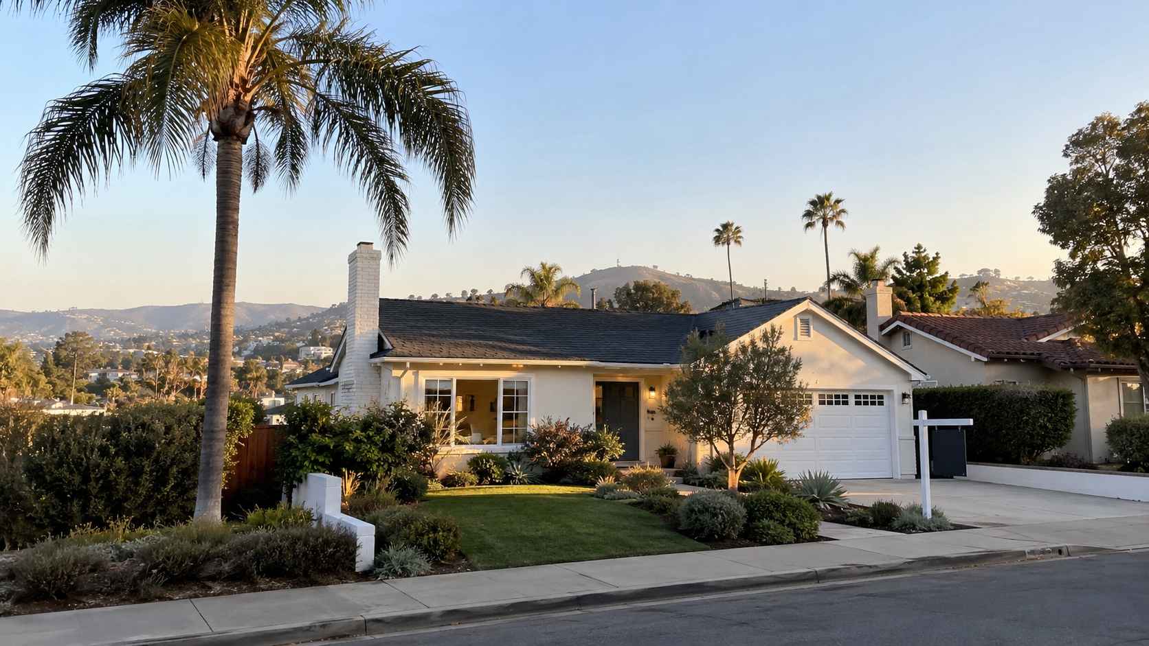 Homes in California - Single-family California home with palm trees and a landscaped front yard.