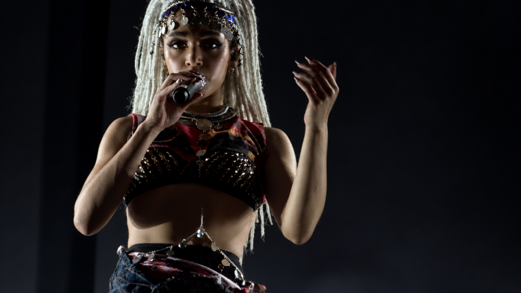 Female singer performing on stage at Pitchfork Music Festival London