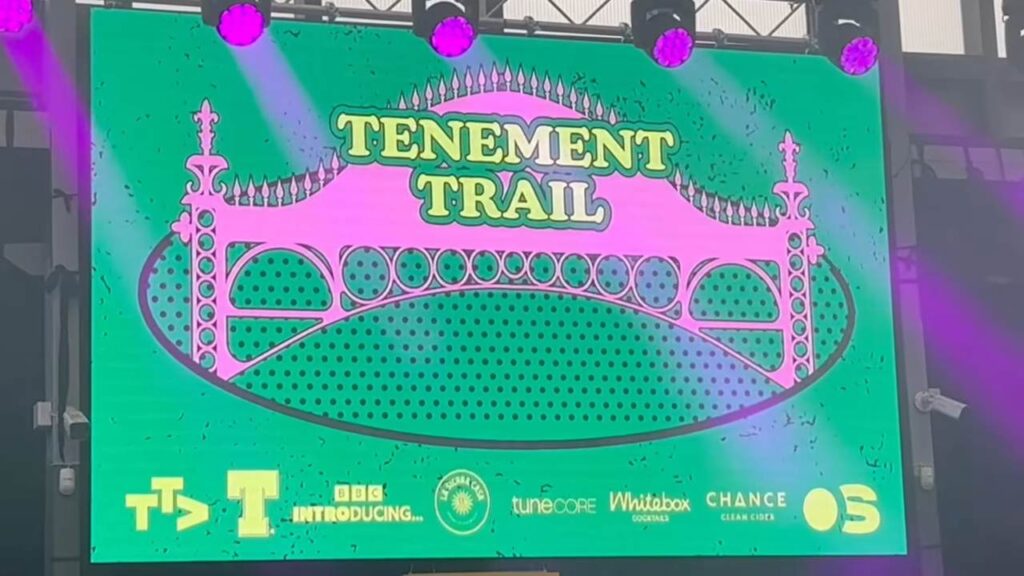 Trail festival screen at a live music event in Glasgow