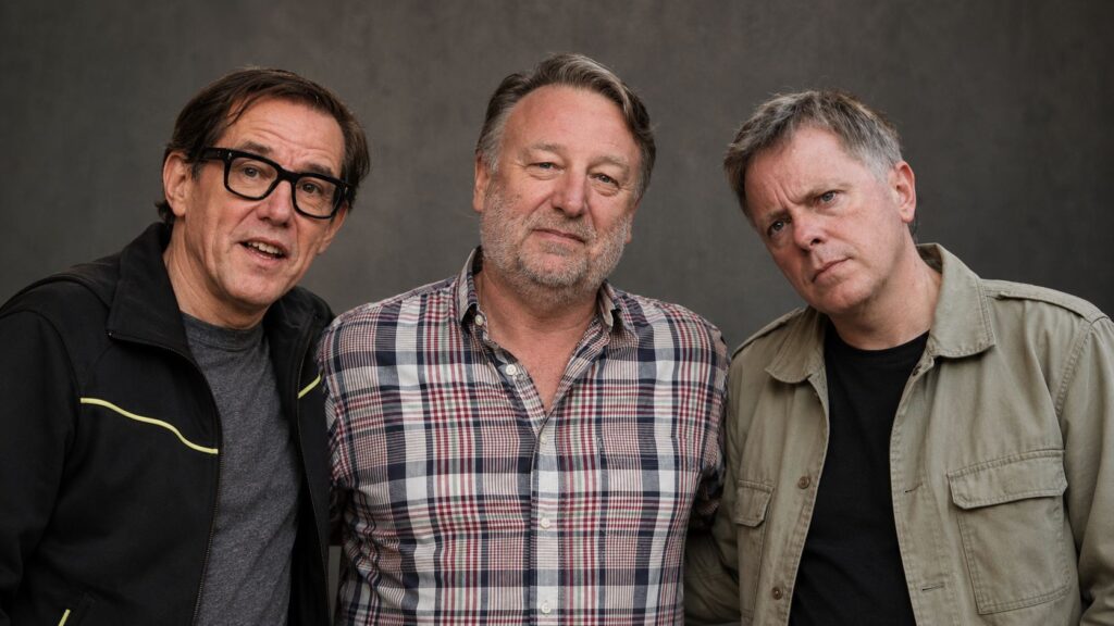 Bernard Sumner, Peter Hook and Stephen Morris pictured together.